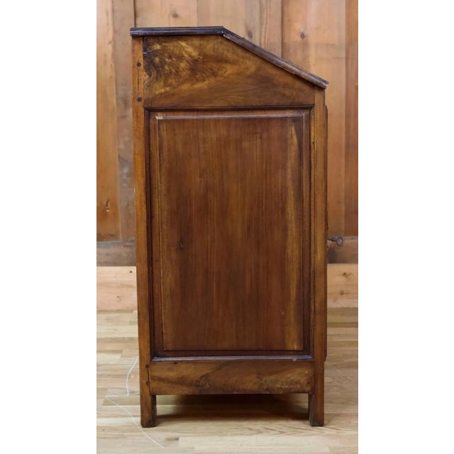 This desk is composed of a cupboard and an openable drawer. Very nice piece of ironwork in metal trim. This little «...