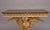 A highly decorative early 20th Century antique gilt and marble top console table in the George II style, having the...
