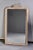 Circa 1860s Louis Philippe mirror is five and half feet tall and features a white painted frame and carved crest. Actual...
