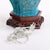 The 20th-century porcelain body of robust hexagonal baluster form, entirely covered in a vivid peacock-blue turquoise...