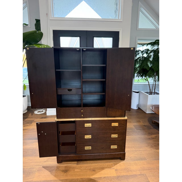 An exceptional 1970s gentleman’s armoire designed by Milo Baughman for Directional Furniture’s prestigious Custom...