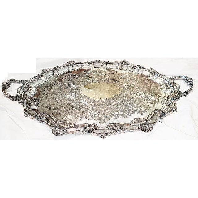 We love this fab 19c English Sheffield silverplated serving tray in rococo style with engraved platter and no feet for...