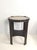 Beautiful side table made of high-quality solid oak with a dark finish. Features a striking, textured polished brass inlay...