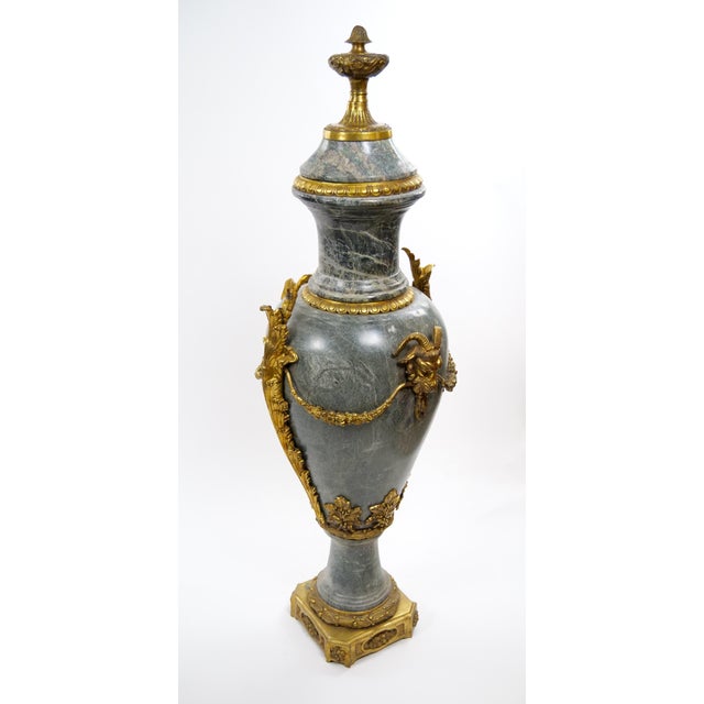 An impressive Italian antique ornamental urn dating to the late 19th century, crafted in gray/green marble with beautiful...