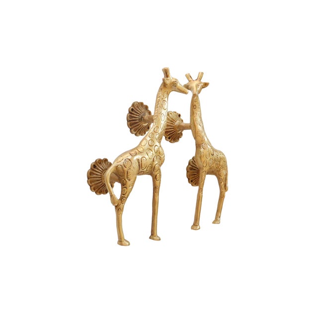 A pair of cast brass giraffe door handles or cabinet pulls with a bright gold finish. Dimensions per handle. We have more...