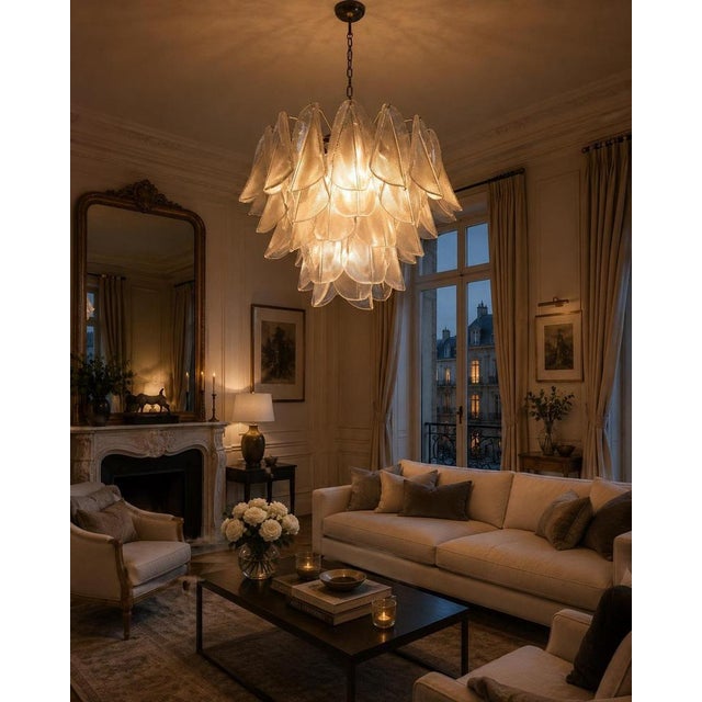 Pair Italian vintage Murano chandeliers. The fixture is made up of 41 individual handblown transparent glass elements...