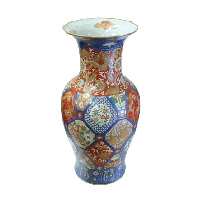 This is a colorful porcelain fat body vase in an oriental Chinese Imari style graphic finish which has a mix of charming...