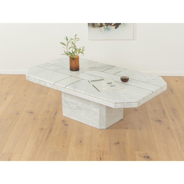 Wonderful coffee table from the 1980s. Base and table top made of high-quality Carrara marble. Made in Germany.