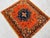 This antique hand-knotted Fachralo Kazak rug features a stepped octagonal medallion in navy with a cross motif at center,...