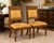 An elegant pair of Henredon “Grand Provenance” dining side chairs showcasing refined neoclassical styling with exceptional...