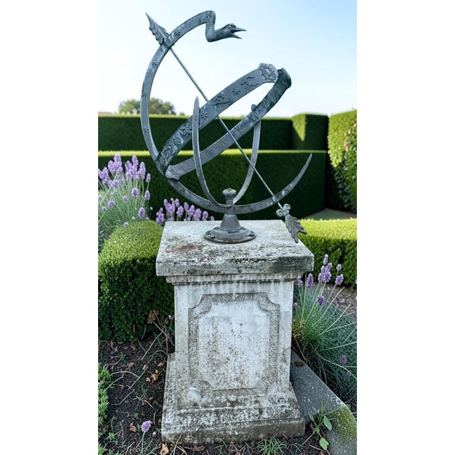 Beautiful large antique armillary sphere or sundial on a classic stone pedestal. a real eye-catcher for a garden, estate,...