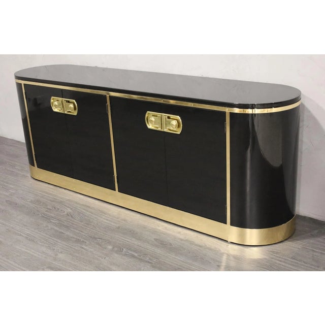 A beautiful restored sideboard by Mastercraft, this iconic pill shaped design from the 1970s is a shining example of mid-...