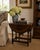 A handsome Jacobean-style drop leaf side table crafted in rich solid walnut. The elegant turned legs and butterfly...