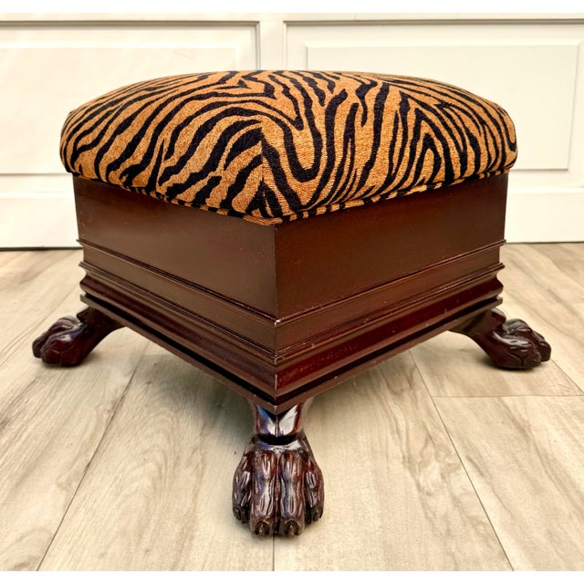 Here is a vintage circa mid-century Chippendale style ottoman with a beautifully detailed wood base, dramatic carved paw...