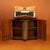 A Mid-Century Modern style bar cabinet, manufactured in London during the 1950s by the prestigious firm Rivington...