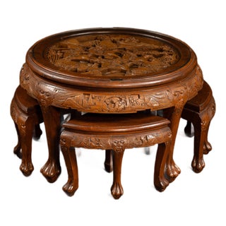 Antique Carved Chinese Nesting Tea Table With Four Stools For Sale