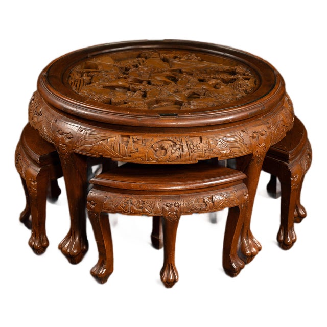 Antique Carved Chinese Nesting Tea Table With Four Stools For Sale