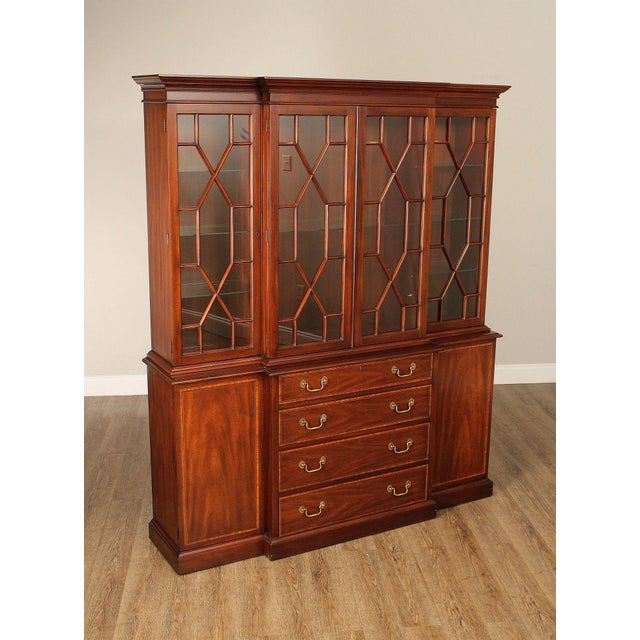 High Quality American Made Inlaid Mahogany Breakfront China Cabinet with Four Glazed Doors Opening to Lighted Interior and...
