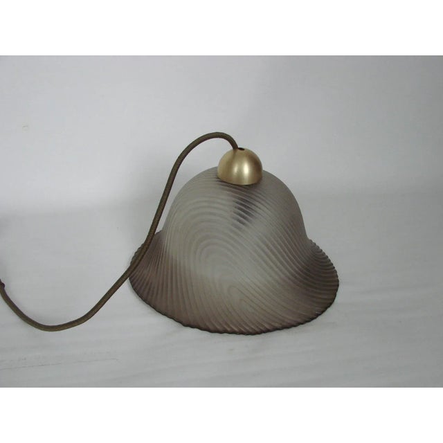 - Hanging lamp produced in the 1970s by Peill & Putzler - Made of thick, molded glass - Requires one E27 bulb - Height...