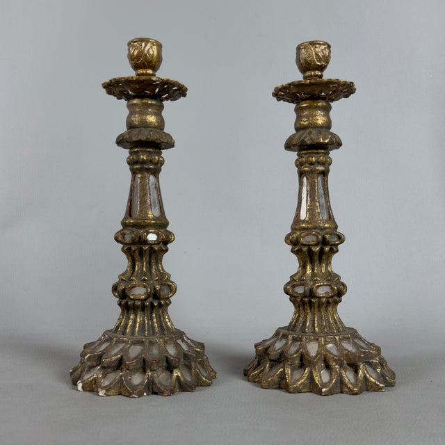 A refined and striking pair of vintage freestanding candlesticks, attributed to fine craftsmanship from the early 20th...
