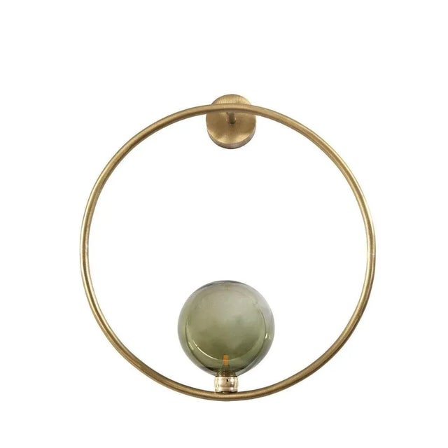 Gaia green sconce by emilie lemardeley dimensions: d38x h19 cm materials: brass and hand blown glass, led 12v / 5w weight:...