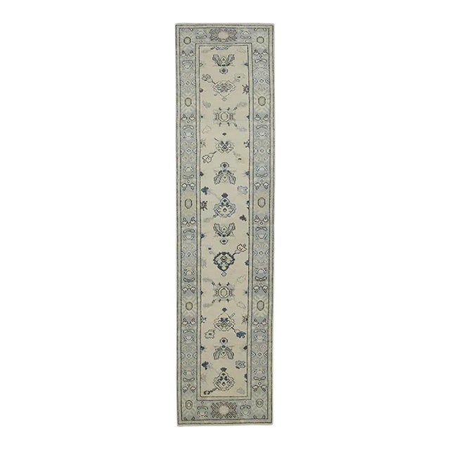 Early 21st Century Cream & Blue Floral Design Handwoven Wool Turkish Oushak Rug 2'4" X 9'10" For Sale