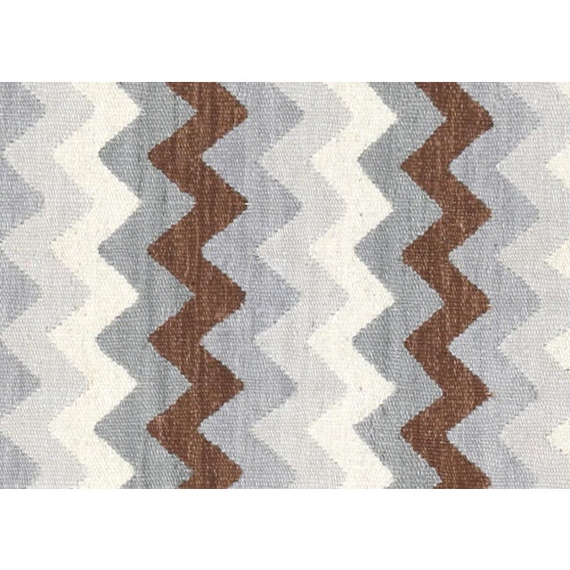 Contemporary Egyptian Kilim. Hand woven in modern designs with wool on cotton foundation in the Fustat region of the Nile...