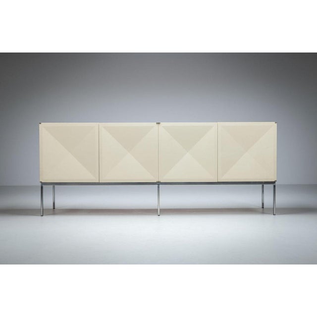 Beautiful sideboard model “Pointe de Diamant” designed by Philippon & Lecoq for Behr, Germany, circa 1960. A striking and...