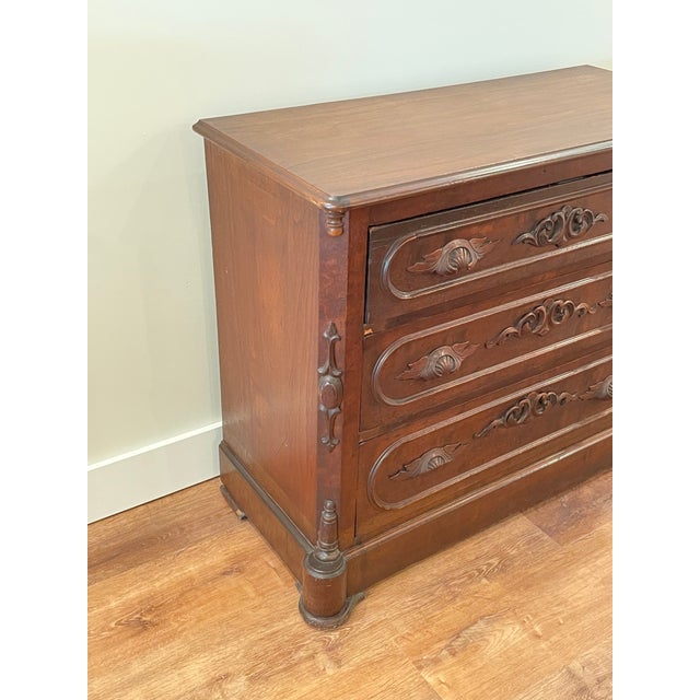 Antique 19th Century Victorian Eastlake Walnut Dresser. Three large drawers without keys. Wear commensurate with age. One...