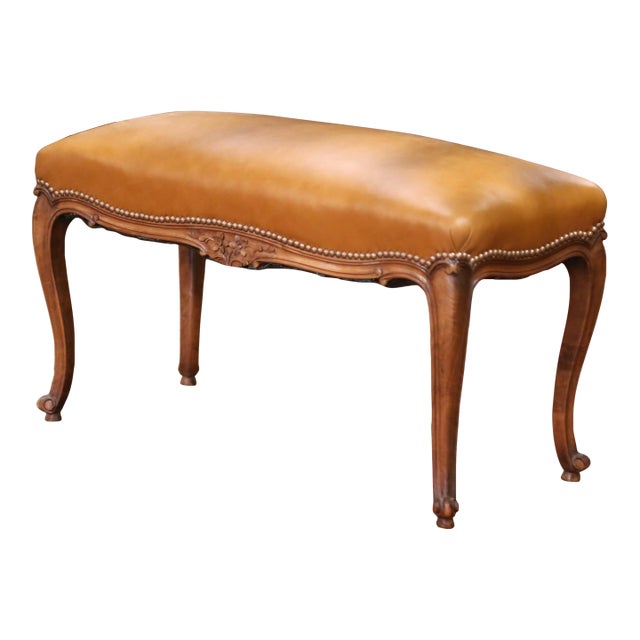 Early 20th Century French Louis XV Carved Walnut Bench With Leather Seat For Sale