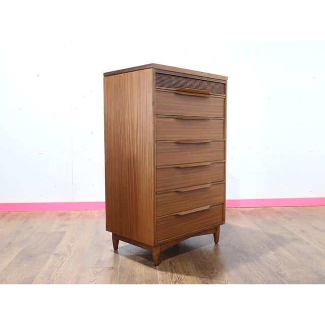 Enhance your living space with the fantastic Mid Century Modern tall boy dresser by British furniture maker White and...