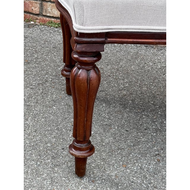 This beautiful 19th Century English bench has been newly upholstered giving it a whole new look and life! A beautiful...