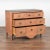Gustavian painted pine chest of three drawers with "Greek key" or meander design along top and pair of griffins on top...