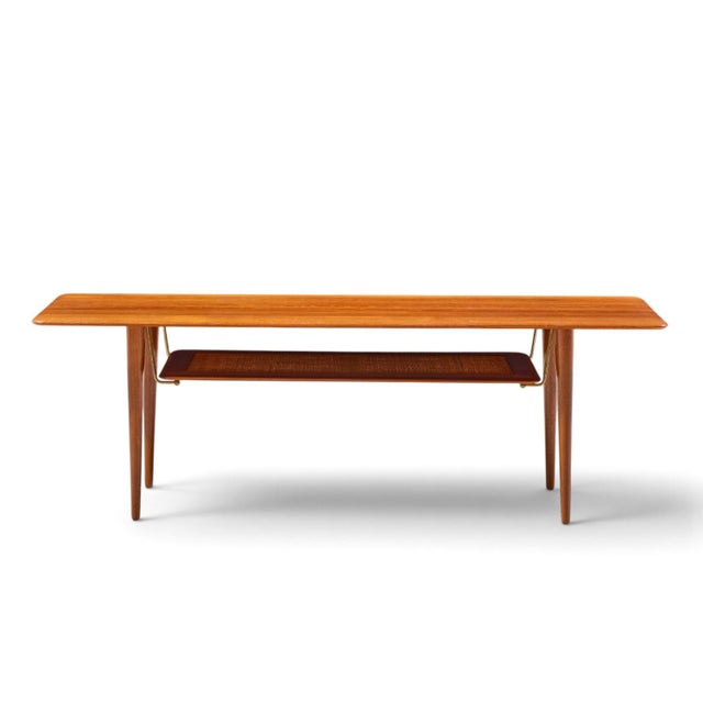 Peter Hvidt & Orla Mølgaard-Nielsen for France and Sons FD-516 Danish Teak Coffee Table This coffee table measures: 59.75...