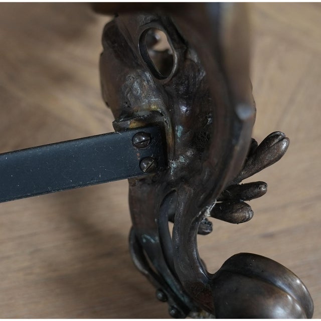 From Niagara Furniture a pair of the finest quality, French style bronze andirons. Completely hand cast using traditional...