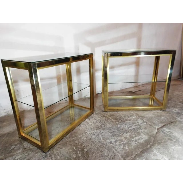 Pair of eTAgere in brass and transparent glass design Renato Zevi. Minimalist and functional design. Quality brass in...