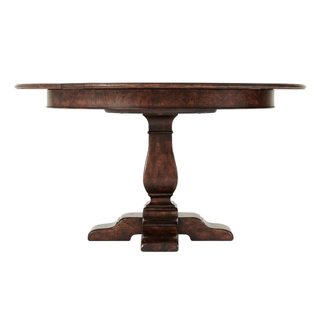 Italian Renaissance style extension dining table. A reclaimed oak and chestnut burl restored circular extending dining...