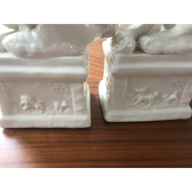 Mid 20th Century Blanc De Chine Ceramic Foo Dogs. A Most Lovely Dynamic Ceramic Duo in an Ivory Glaze-Set of 2 For Sale - Image 11 of 12