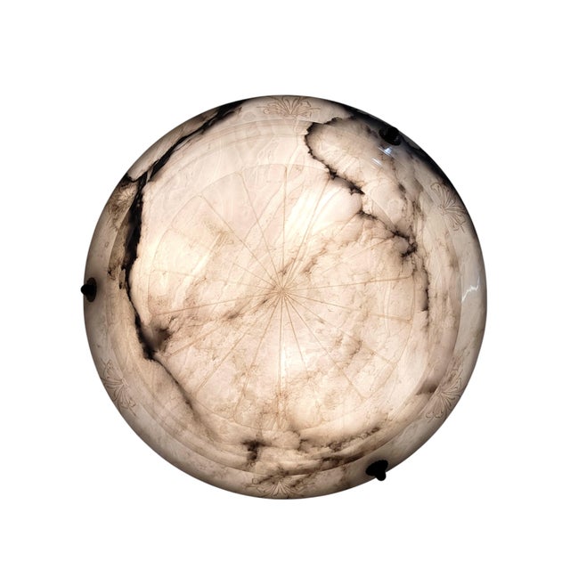 Elegant and authentic French Art Deco alabaster pendant chandelier, masterfully carved in a graceful bowl silhouette with...