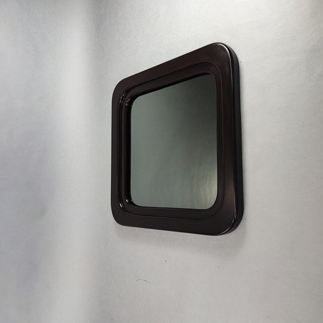 Vintage 70's square smoked glass mirror. Dark brown wooden frame. Design period: 1970-1979 Material: wood, mirror Color:...