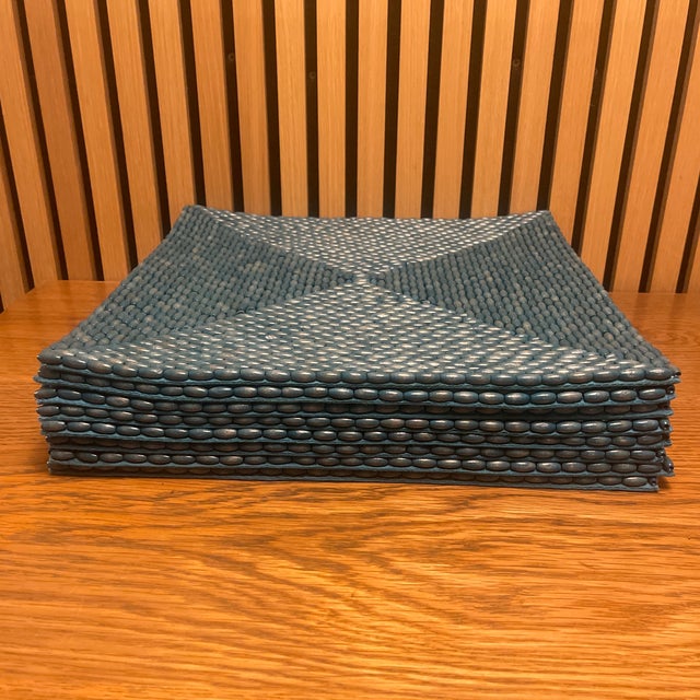 Elevate your table with this sophisticated set of eight Kim Seybert hand-beaded placemats, featuring a richly textured...