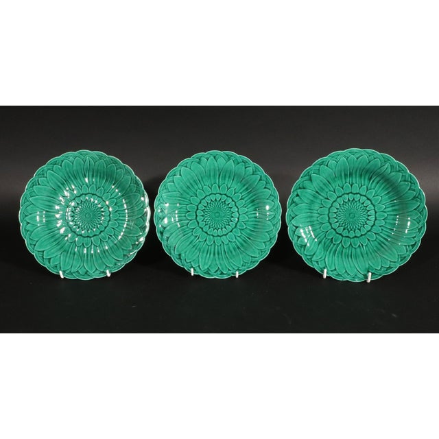 Wedgwood Pottery Green Majolica Sunflower Plates, Aesthetic Movement, Fifteen Plates, Circa 1860s The Wedgwood majolica...