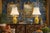 Offering a restored pair of vintage Chinese crackled yellow porcelain table lamps with three dimensional handles decorated...