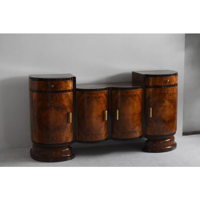 Pair of original 1930s Art Deco sideboards in solid wood with walnut burl veneer. Original period handles and locks. Also...