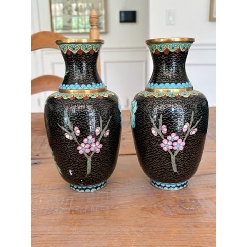 Pair Antique Cloisonné Vases is a timeless example of the genre, displaying a well-preserved, rich coloration and...