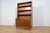 This Mid-Century Danish designed shelf was designed by Johannes Sorth and manufactured by Bornholms Møbelfabrik. It is...