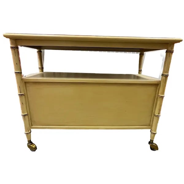 Vintage Tea/Bar Wagon with bamboo style supports, open shelf, molding and 2 magnetic doors w/brass door pulls(4.5” spread...