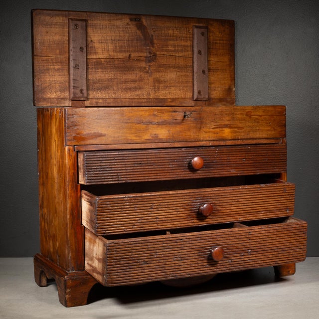 ABOUT An antique machinist's oak tool chest with round wooden pulls, original key, three descending graduated drawers with...