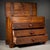 ABOUT An antique machinist's oak tool chest with round wooden pulls, original key, three descending graduated drawers with...