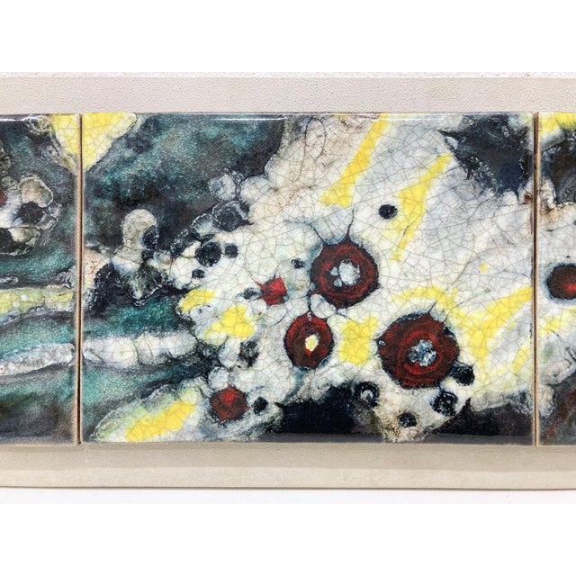 Decorative wall object from the 60s and 70s. 3 wall panels made of glazed ceramic (28 x 38 x 2 cm), mounted (screwed) onto...